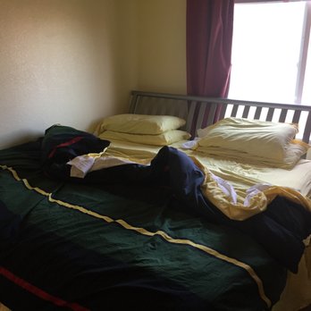 Rxo - New mattress underneath sweet Ralph Lauren bedding in the yellow room - Shipping Centers Near Me - Sacramento, California