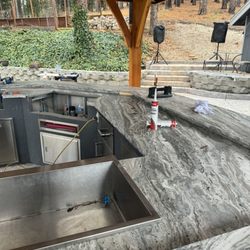 Innovative Stone & Tile - New Fantasy Brown stone installed on outdoor kitchen.