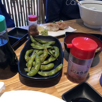 Aka Sushi and Ramen - Oily spicy edamame. Behind it Albacore roll. The fish was bad. - Sushi Bars Near Me - Hermosa Beach, California Aka Sushi and Ramen - Oily spicy edamame. Behind it Albacore roll. The fish was bad. - Sushi Bars Near Me - Hermosa Beach, California