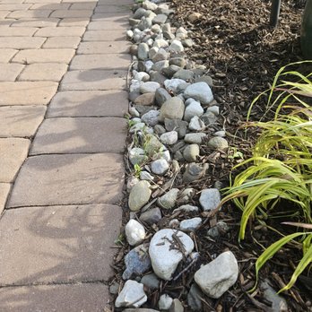Unique Services  - Weeds in rock trim - Landscaping Near Me - Branchville, New Jersey