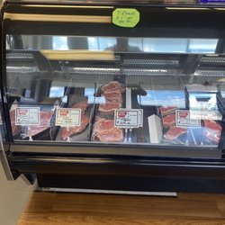 One Bite Meat Market, - Meat counter.  Everything behind glass and under plastic wrap.  Nice!