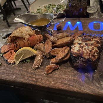 Primo Steak and Seafood - Surf & Turf with side salad and potato wedges! Dynamite - Seafood Near Me - Gurnee, Illinois Primo Steak and Seafood - Surf & Turf with side salad and potato wedges! Dynamite - Seafood Near Me - Gurnee, Illinois