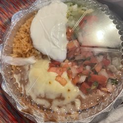 El Rincon Mexican Restaurant - Specified to be plain rice, no beans no salad. This is what he received.....