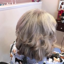 Wish we had a before....she went from a fire engine red..to a cool silver.....color by Dee!