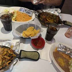 Chicken and beef fajita. Dinners , Chips , salsa , Pepsi .