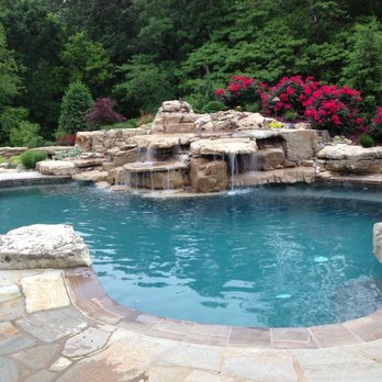 Semco Stone - This gorgeous pool area features our boulders & ledge, coping, flagstone, and more! - Building Supplies Near Me - Perryville, Missouri