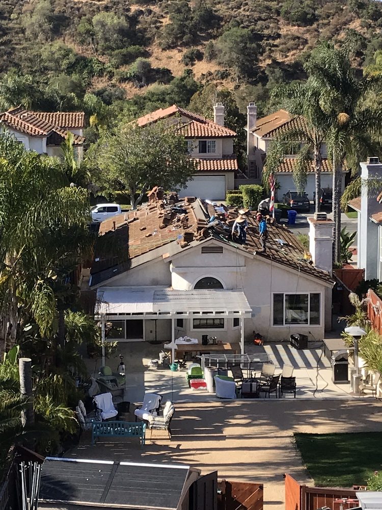 Slide of Urbach Roofing