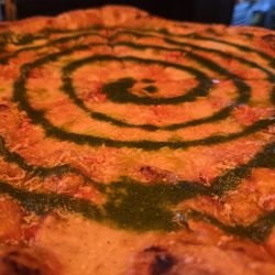 Vodka pizza with basil oil