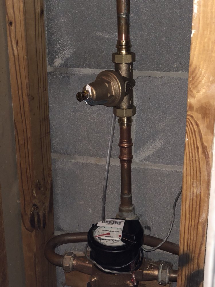 Slide of MJW Plumbing Company