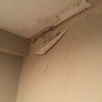 DaBella - Bathroom leak that has built up over time. Directly beneath one of their ugly as sin air intake slits. - Roofing Near Me - Vancouver, Washington DaBella - Bathroom leak that has built up over time. Directly beneath one of their ugly as sin air intake slits. - Roofing Near Me - Vancouver, Washington