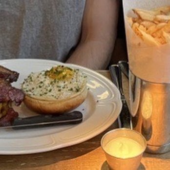 Au Cheval - Double Cheeseburger  (left- with bacon and an egg), Crispy Fries (middle), Single Cheeseburger (right- with bacon) - Bars Near Me - Chicago, Illinois