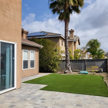 Install It Direct - ows a patio with a palm tree - Landscaping Near Me - Encinitas, California