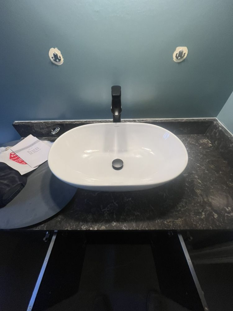 Slide of REM Plumbing