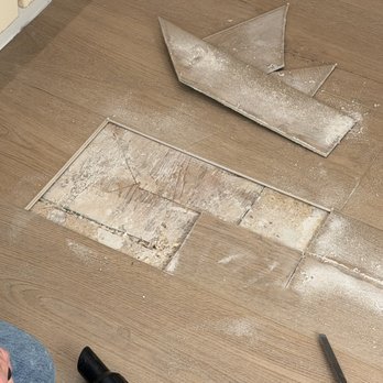 Soul Builders - Destructive testing by an inspector showing debris and subfloor that has not been prepped - General Contractors Near Me - Millcreek, Utah Soul Builders - Destructive testing by an inspector showing debris and subfloor that has not been prepped - General Contractors Near Me - Millcreek, Utah
