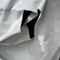 DOT Furniture - This is the tear at the corner. Clearly started small and the wind made it worse.