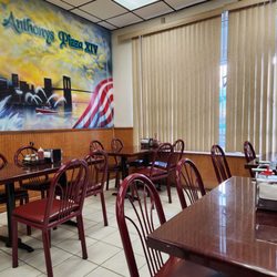 Anthony's Pizza - They pulled out the booths and put in some nice new table and chairs!