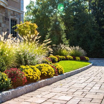 K Macken Landscaping - a front yard with a brick walkway - Landscaping Near Me K Macken Landscaping - a front yard with a brick walkway - Landscaping Near Me