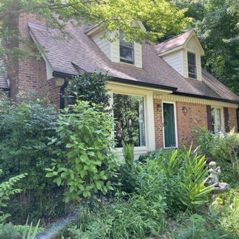 Alumen Seamless Gutter Service - This shows the new gutter and the nice work on the dormers. - Gutter Services Near Me