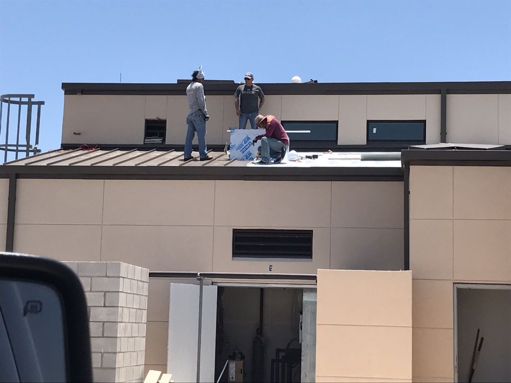 Slide of Iron Clad Roofing and Renovations