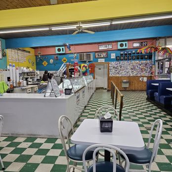 Salem Ice Cream Parlor - A view of the entire restaurant from the table and chairs seating area of the place. - Ice Cream & Frozen Yogurt Near Me - Salem, Virginia Salem Ice Cream Parlor - A view of the entire restaurant from the table and chairs seating area of the place. - Ice Cream & Frozen Yogurt Near Me - Salem, Virginia