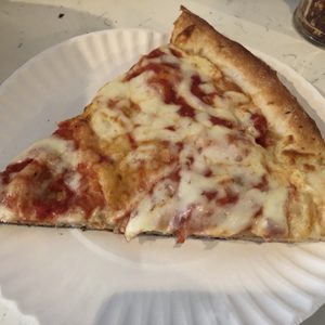 Photo of 2 Bros Pizza - New York, NY, United States. Cheese slice ($1)
