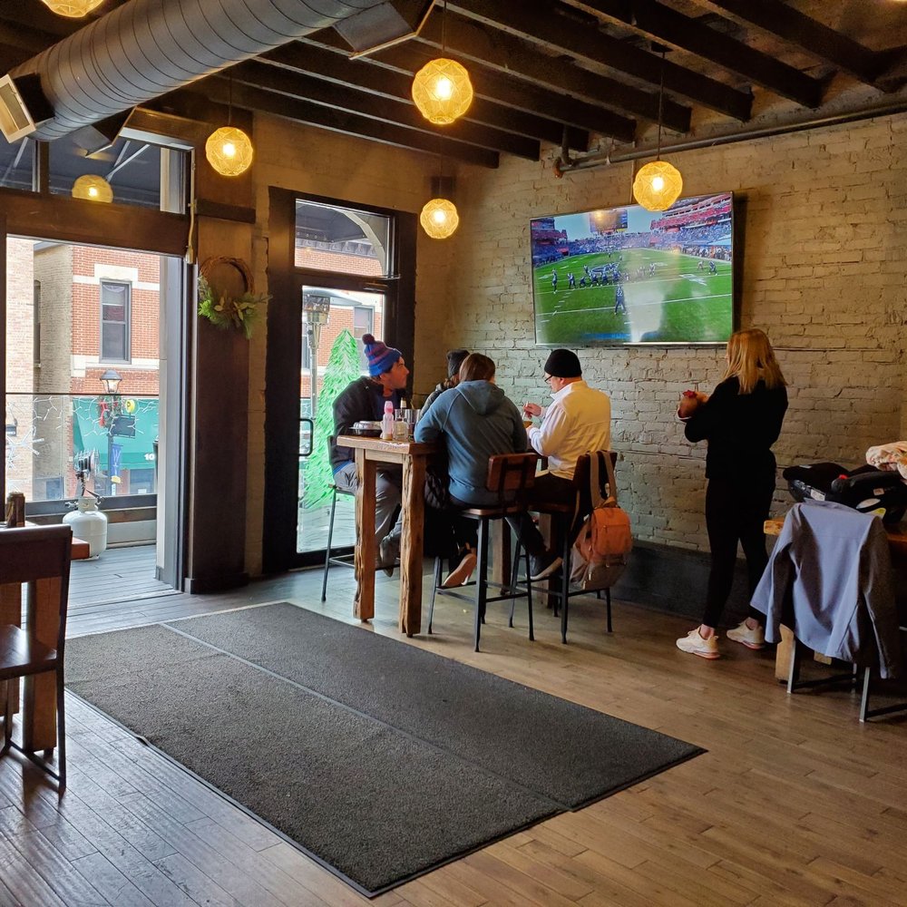 The Burger Social - people sitting at tables in a restaurant - Bars Near Me - Wheaton, Illinois The Burger Social - people sitting at tables in a restaurant - Bars Near Me - Wheaton, Illinois