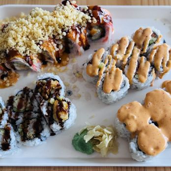 Sushi Neko - Clockwise from top L: Fire Cracker Roll, Spicy Tuna Roll, Spicy California Roll (6pc), Shrimp Tempura Roll - Sushi Bars Near Me - Rochester Hills, Michigan Sushi Neko - Clockwise from top L: Fire Cracker Roll, Spicy Tuna Roll, Spicy California Roll (6pc), Shrimp Tempura Roll - Sushi Bars Near Me - Rochester Hills, Michigan