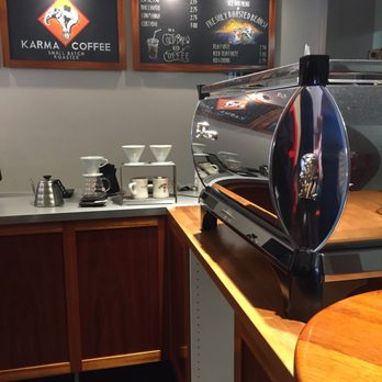 Karma Coffee Roasters - a coffee machine on a counter - Coffee & Tea Near Me - Sudbury, Massachusetts Karma Coffee Roasters - a coffee machine on a counter - Coffee & Tea Near Me - Sudbury, Massachusetts