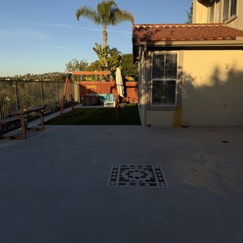 Haul Boss - Back yard renovation -- installed tile & artificial Turf - Landscaping Near Me Haul Boss - Back yard renovation -- installed tile & artificial Turf - Landscaping Near Me