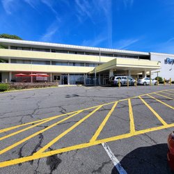 The view from the parking lot of the storefront. It's in the Days Inn.