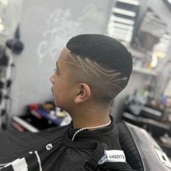Protocol Barber Shop - King james with another fire design with fade Instagram: Kingjames_fades Barber : King James