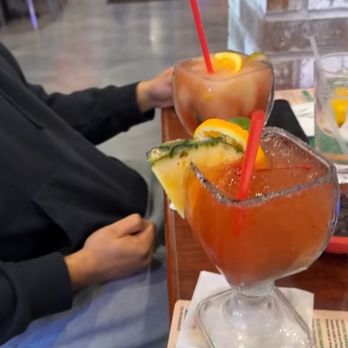 El Viejo Tony - a woman sitting at a table with a drink - Bars Near Me - DeRidder, Louisiana El Viejo Tony - a woman sitting at a table with a drink - Bars Near Me - DeRidder, Louisiana