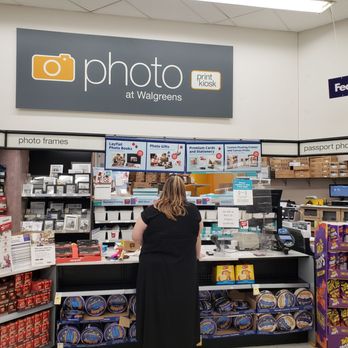 Walgreens - a woman shopping in a store - Drugstores Near Me - Mountain Home, Arkansas