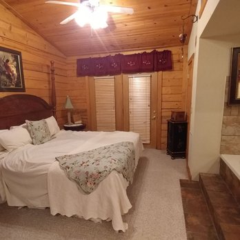 The Cabins At Grand Mountain - Excuse the messy bed, this is our third day here so I threw it together for the photo real fast. Hot tub is right across. - Vacation Rentals Near Me - Branson, Missouri The Cabins At Grand Mountain - Excuse the messy bed, this is our third day here so I threw it together for the photo real fast. Hot tub is right across. - Vacation Rentals Near Me - Branson, Missouri