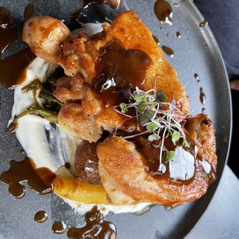 Amelie - a plate of food on a table - French Near Me - New York, New York