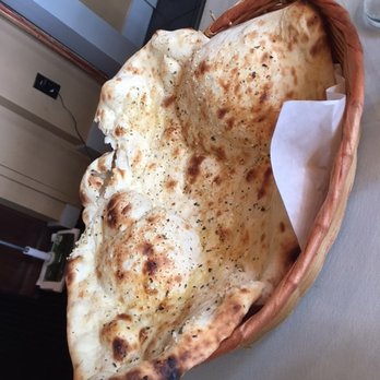 Saffron Grill - Garlic Naan (minus cilantro) - Indian Near Me - Seattle, Washington Saffron Grill - Garlic Naan (minus cilantro) - Indian Near Me - Seattle, Washington