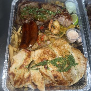 Los Valcarcel - two trays of food - Food Trucks Near Me - Naranja, Florida