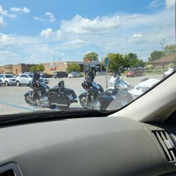 Arena Bar and Grill - Don't go here if you need access to handicap spaces. They allow all their entitled bikers to park in the striped lines and spots