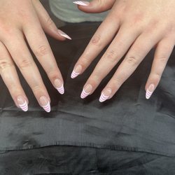 Pink striped nails done by Andy!