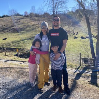 Buffalo Creek Vacations - Last family pic with bison roaming - Vacation Rentals Near Me - Clyde, North Carolina