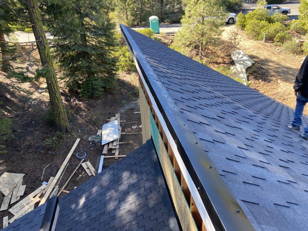 Slide of Modern Roofers and Restoration