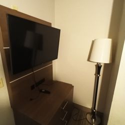 Holiday Inn Express & Suites Somerset Central - T.V., lamp, and cabinet in the "kids" extension room (part of the hotel room).