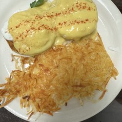 Two D's Diner - Classic eggs Benedict with hash browns.