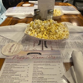 Noggin Room Pub - Popcorn on the tables salty enough to encourage more drinks! - American Near Me - Petoskey, Michigan Noggin Room Pub - Popcorn on the tables salty enough to encourage more drinks! - American Near Me - Petoskey, Michigan