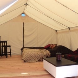 Log House Rv Park - Luxury tent w/King bed, futon,, dining table, dresser, porch overlooking the Wallowa Mountains.