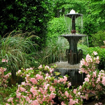 Southern Trillium Landscape Design and Installation - a fountain surrounded by flowers - Landscaping Near Me Southern Trillium Landscape Design and Installation - a fountain surrounded by flowers - Landscaping Near Me