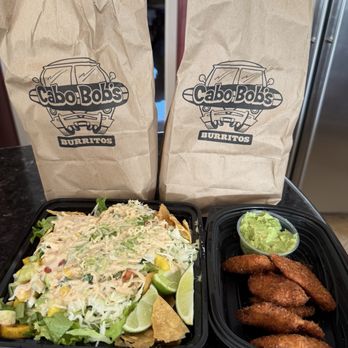 Cabo Bob's Burritos - Fish nachos with the works - Mexican Near Me - Houston, Texas Cabo Bob's Burritos - Fish nachos with the works - Mexican Near Me - Houston, Texas