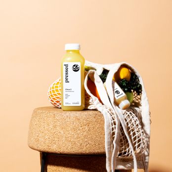 Pressed Juicery - a bag of fruit and a bottle of juice - Juice Bars & Smoothies Near Me - Studio City, California Pressed Juicery - a bag of fruit and a bottle of juice - Juice Bars & Smoothies Near Me - Studio City, California