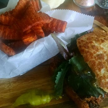 Freshwater Tavern - Crunchy chicken sandwich with sweet potato fries - New American Near Me - Gladstone, Michigan Freshwater Tavern - Crunchy chicken sandwich with sweet potato fries - New American Near Me - Gladstone, Michigan