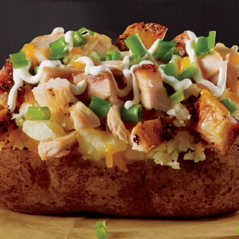 True Texas BBQ - Texas sized stuffed potato with Natural Turkey. - Barbeque Near Me - Killeen, Texas True Texas BBQ - Texas sized stuffed potato with Natural Turkey. - Barbeque Near Me - Killeen, Texas